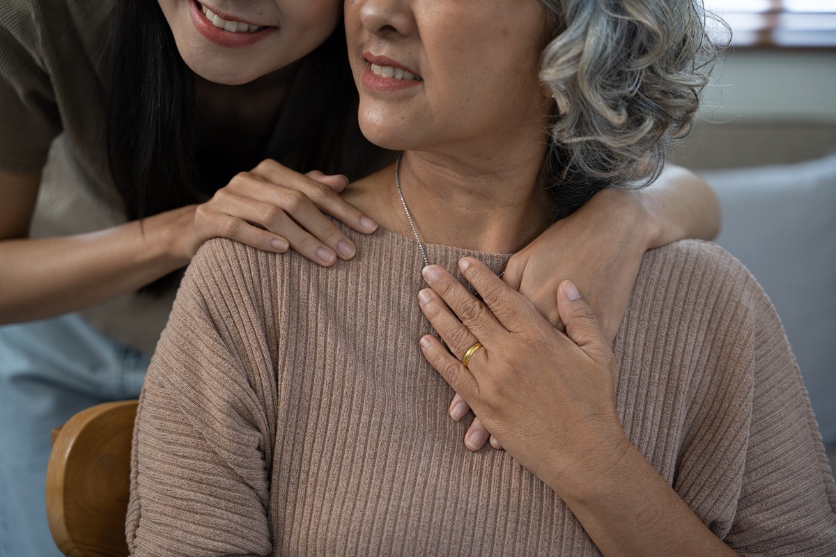 Elderly woman with her daughter at home. Elderly woman with her daughter at home.
