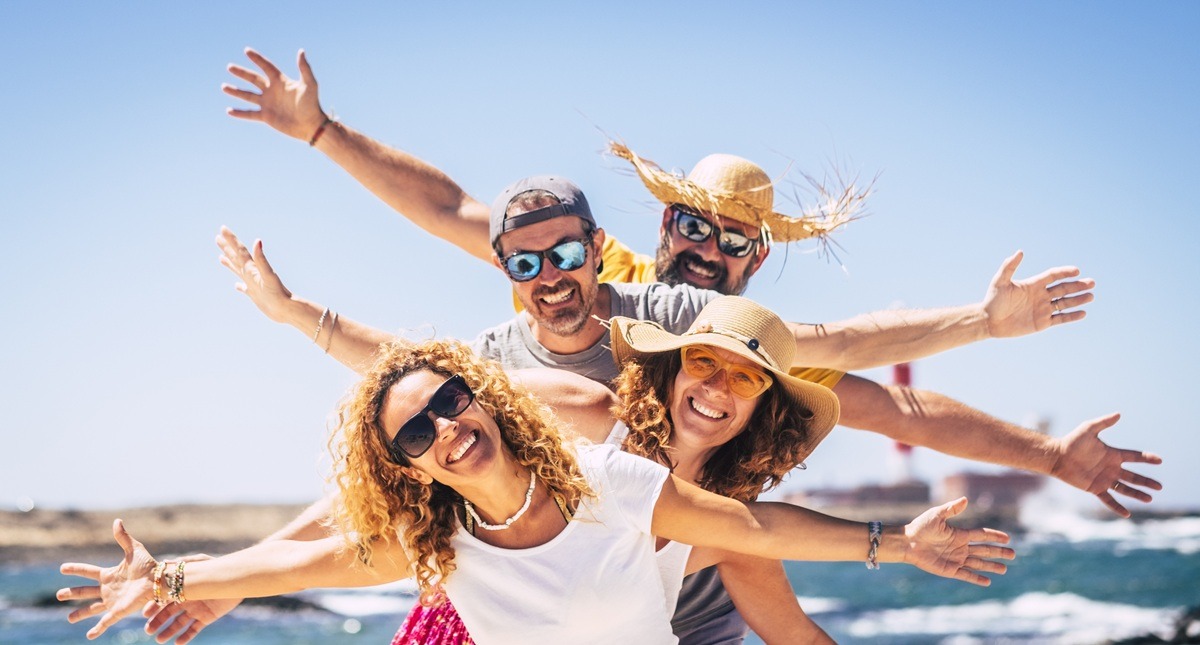 Group of happy adult friends enjoy and celebrate together the summer holiday vacation travel leisure activity. Group of happy adult friends enjoy and celebrate together the summer holiday vacation travel leisure activity.